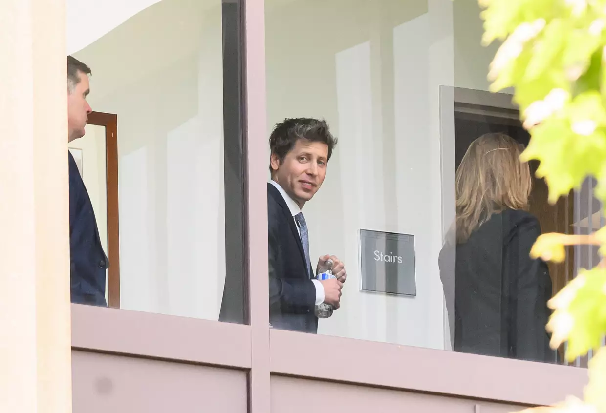 OpenAI CEO Sam Altman walks inside the federal courthouse during a recess in the proceedings in the trial over Elon Musk's lawsuit against OpenAI in Oakland, California, on May 12, 2026.
