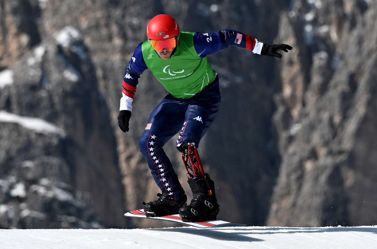Mike Schultz of Team USA competes during the Para Snowboard Cross quarterfinals at the 2026 Milan Cortina Winter Paralympics on March 08, 2026 in Cortina d'Ampezzo, Italy.