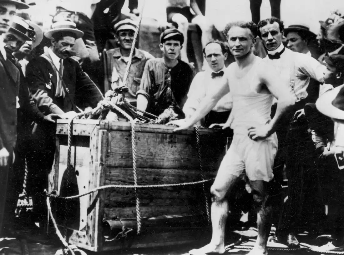 Escape artist Harry Houdini is shown before being lowered in a packing crate into the ice-covered Detroit River in 1907.