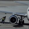 A worker fuels a Delta Airlines plane at Salt Lake City International Airport on April 09, 2026. As fuel prices continue to rise amid the war in Iran, airlines around the world are canceling flights and scaling back routes due to surging jet fuel prices.