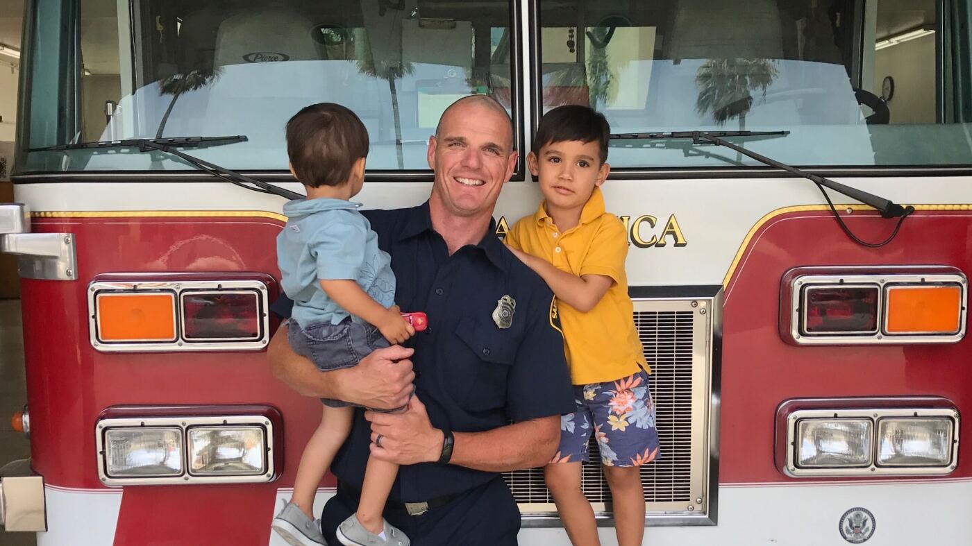 A California fifth grader interviews his firefighter father : NPR