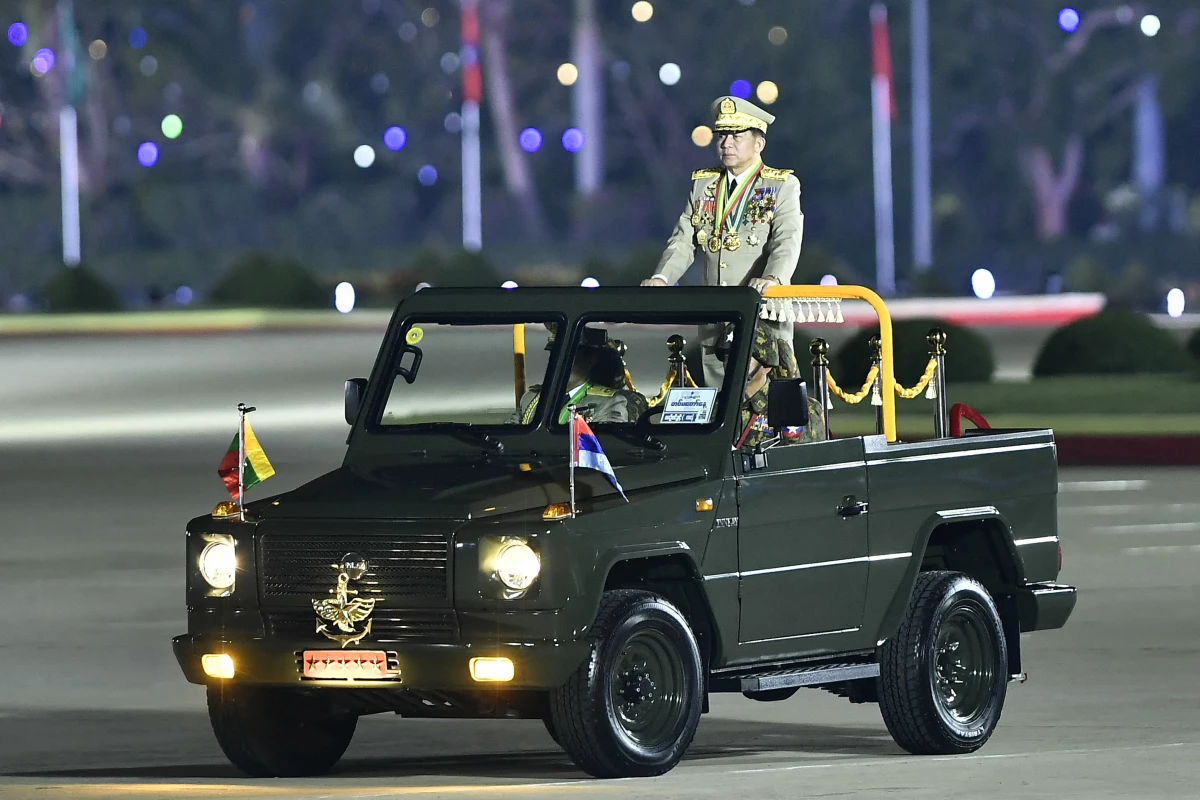 Myanmar's junta chief military Min Aung Hlaing arrives to deliver a speech during a ceremony to mark the country's Armed Forces Day in Naypyidaw on March 27, 2024. Myanmar's junta chief on March 27, 2024 blamed the country's growing armed resistance movement for preventing long-promised elections in a speech to thousands of soldiers following an Armed Forces Day parade.