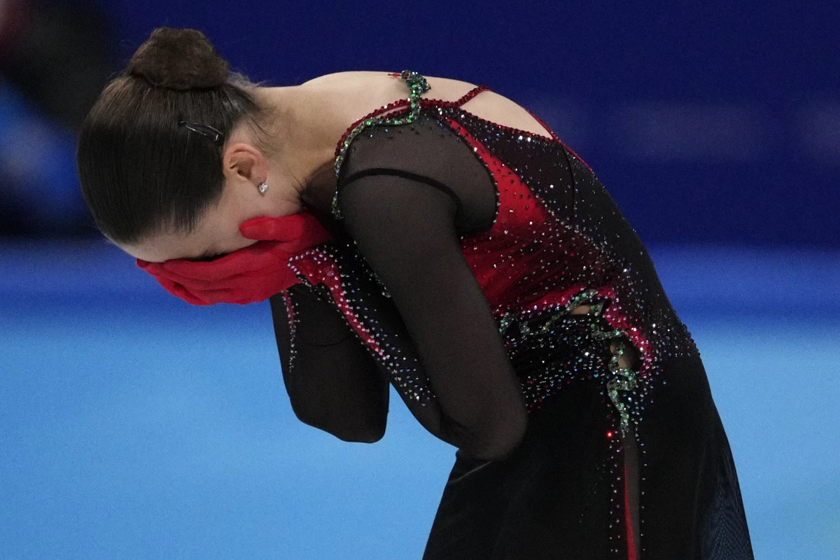 Kamila Valieva, of the Russian Olympic Committee, reacts after the women's free skate program during the figure skating competition at the 2022 Winter Olympics, Thursday, Feb. 17, 2022, in Beijing.  An international sports tribunal has rejected Russian appeals of her disqualification linked to a sports doping scandal.  (AP Photo/Bernat Armangue, File)