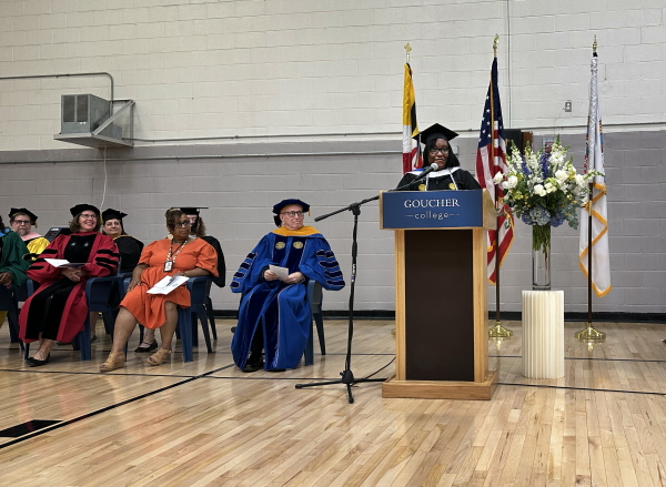 Janet Johnson, who spent the last 10 years working toward a college degree in prison, presents her senior thesis at her college graduation ceremony.