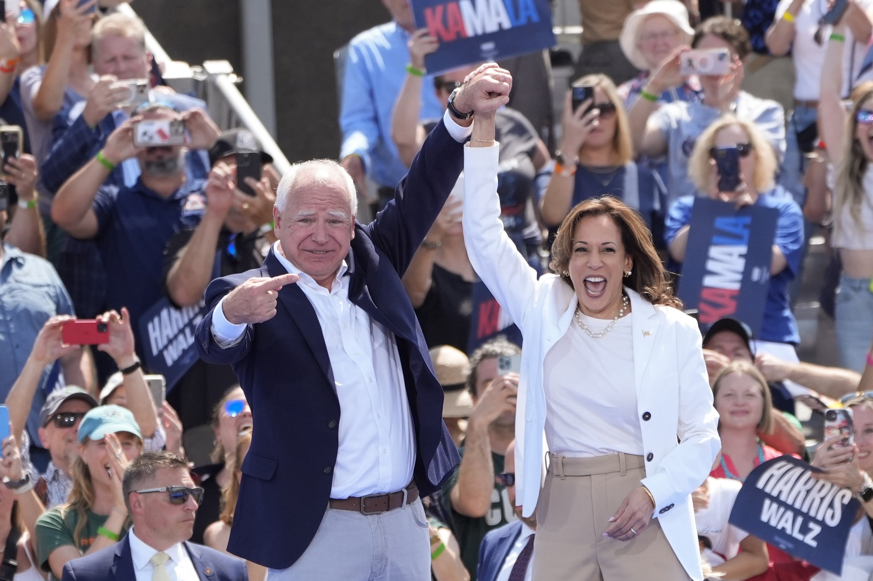 Democratic presidential nominee Vice President Kamala Harris is welcomed by Democratic vice presidential nominee Minnesota Gov. Tim Walz, before she delivers remarks at a campaign event, Wednesday, Aug. 7, 2024, in Eau Claire, Wisc. (AP)
