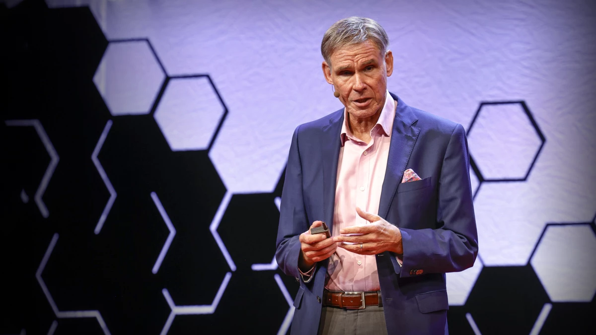 Dr. Eric Topol stands onstage for his TED Talk 'Can AI Catch What Doctors Miss?'