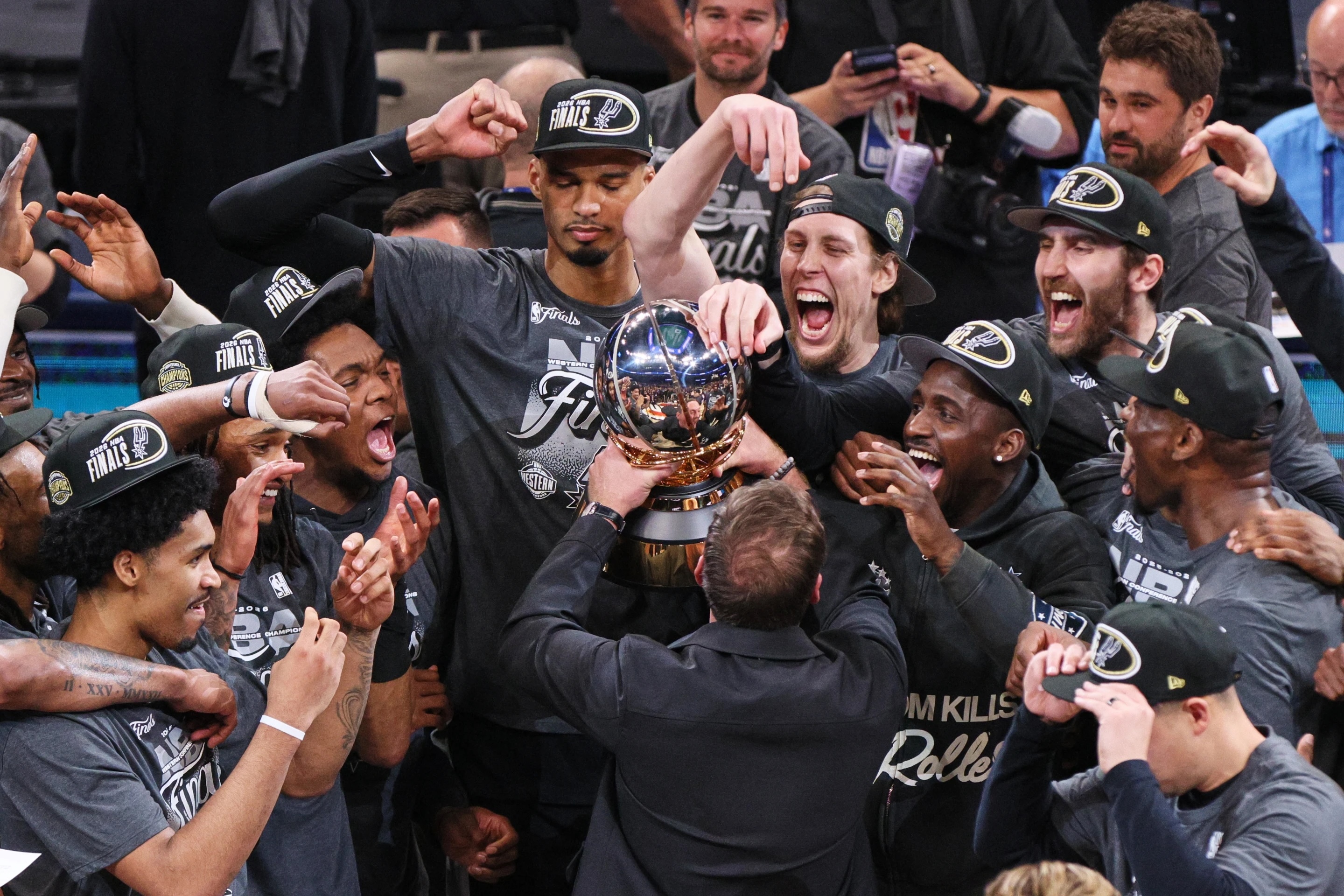 The San Antonio Spurs celebrate after defeating the Oklahoma City Thunder in the Western Conference finals of the NBA basketball playoffs series Saturday, May 30, 2026, in Oklahoma City.