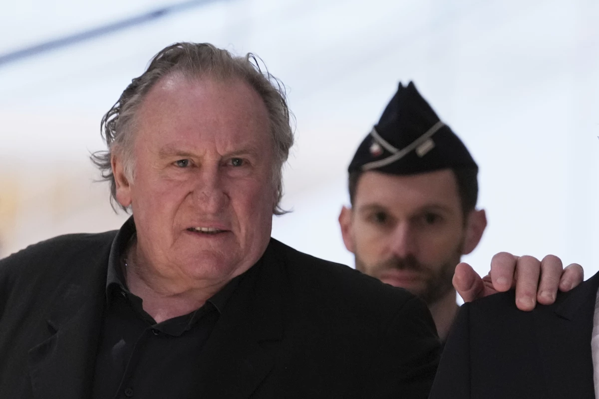 Actor Gerard Depardieu arrives to face trial for the alleged sexual assaults of two women on a film set in 2021 on Monday.