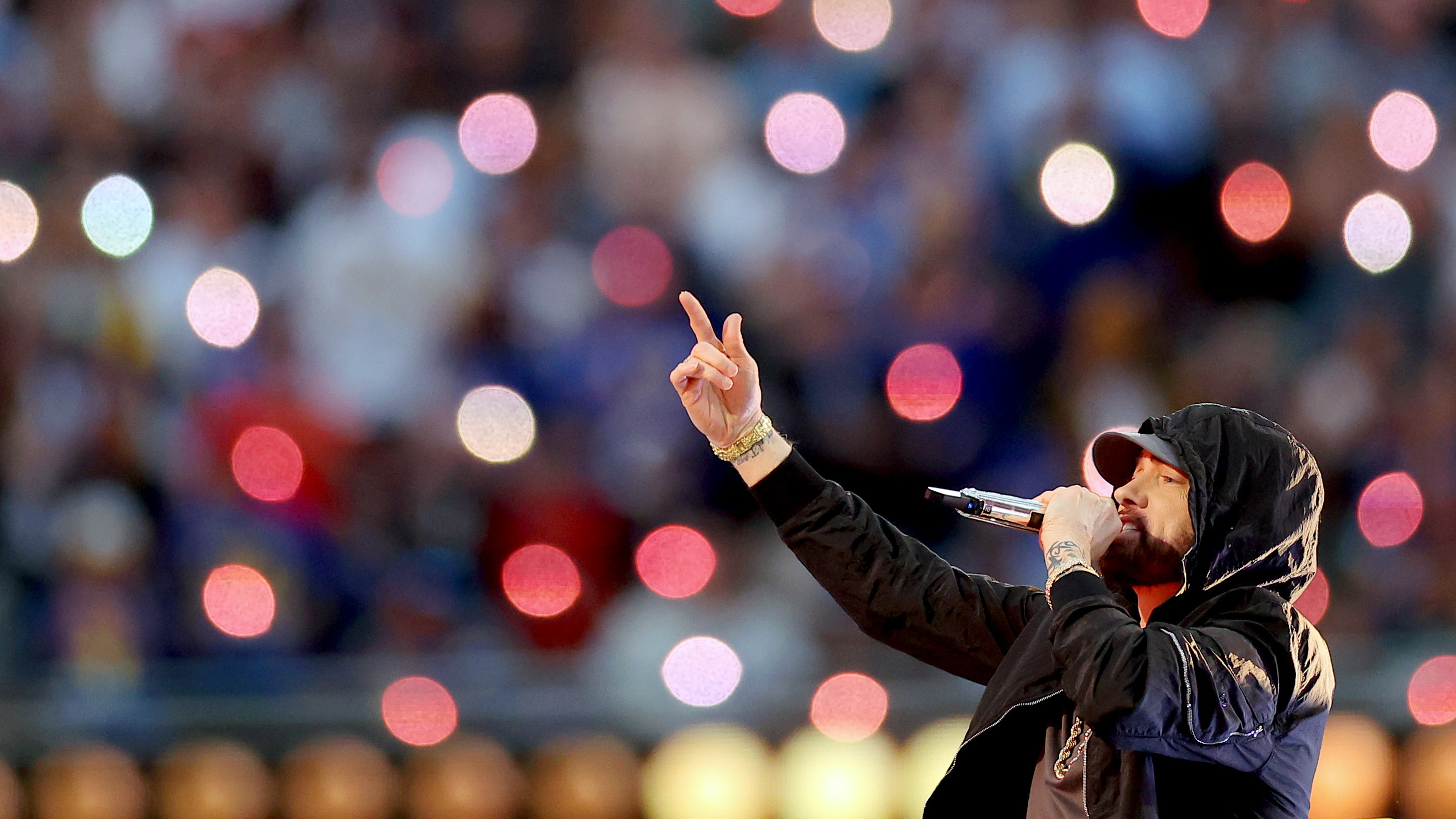 Eminem, performing here during the Super Bowl LVI Halftime Show at SoFi Stadium in 2022, returns to the top 10 of the <em>Billboard</em> Hot 100 chart this week with "Houdini."