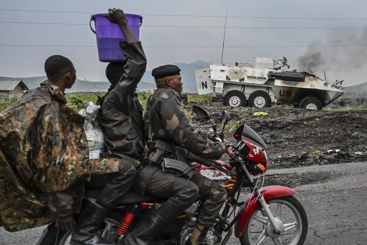 A UN armoured personnel carrier burns during clashes with M23 rebels outside Goma, Democratic Republic of the Congo, Saturday, Jan. 25, 2025.