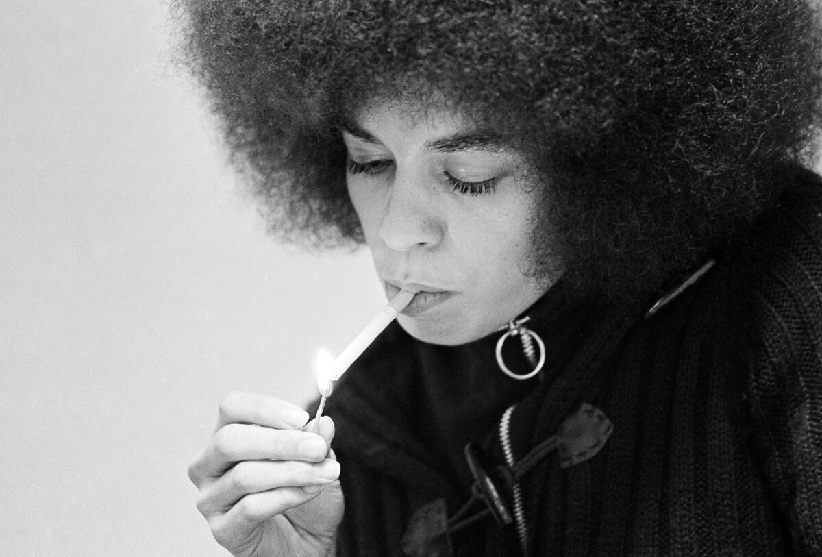 Professor and activist Angela Davis during an interview with AP reporters at the Santa Clara County jail in Palo Alto, Calif. on Dec. 27, 1971. At the time, Davis was on trial for conspiracy for murder charges, which she was acquitted of in June 1972.