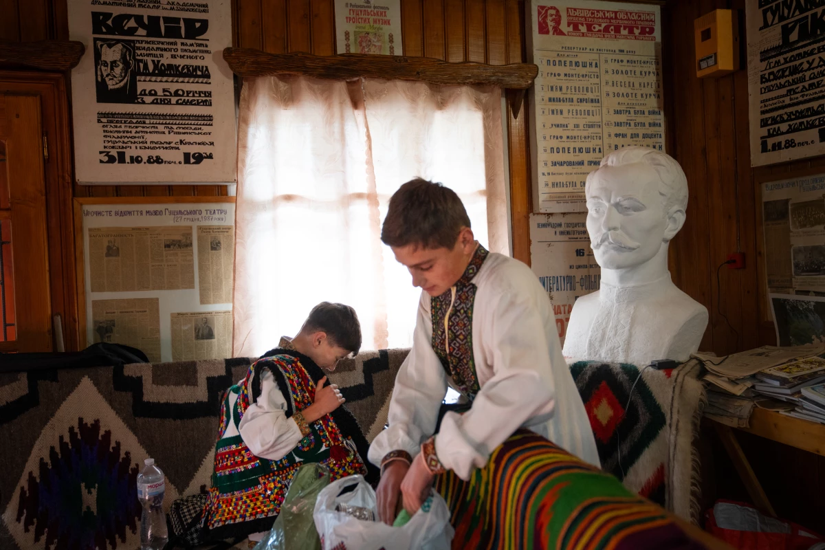 Vasyl Zhykaliak, 15, and his 11-year-old brother, Dmytro, prepare to rehearse a play at Hutsul Theater.