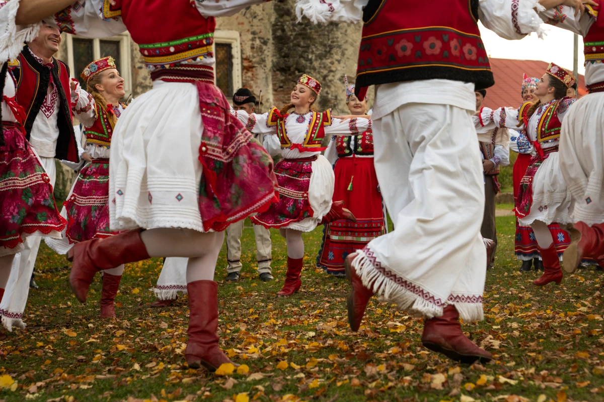 The Transcarpathian Folk Choir performs a dance while filming a music video.
