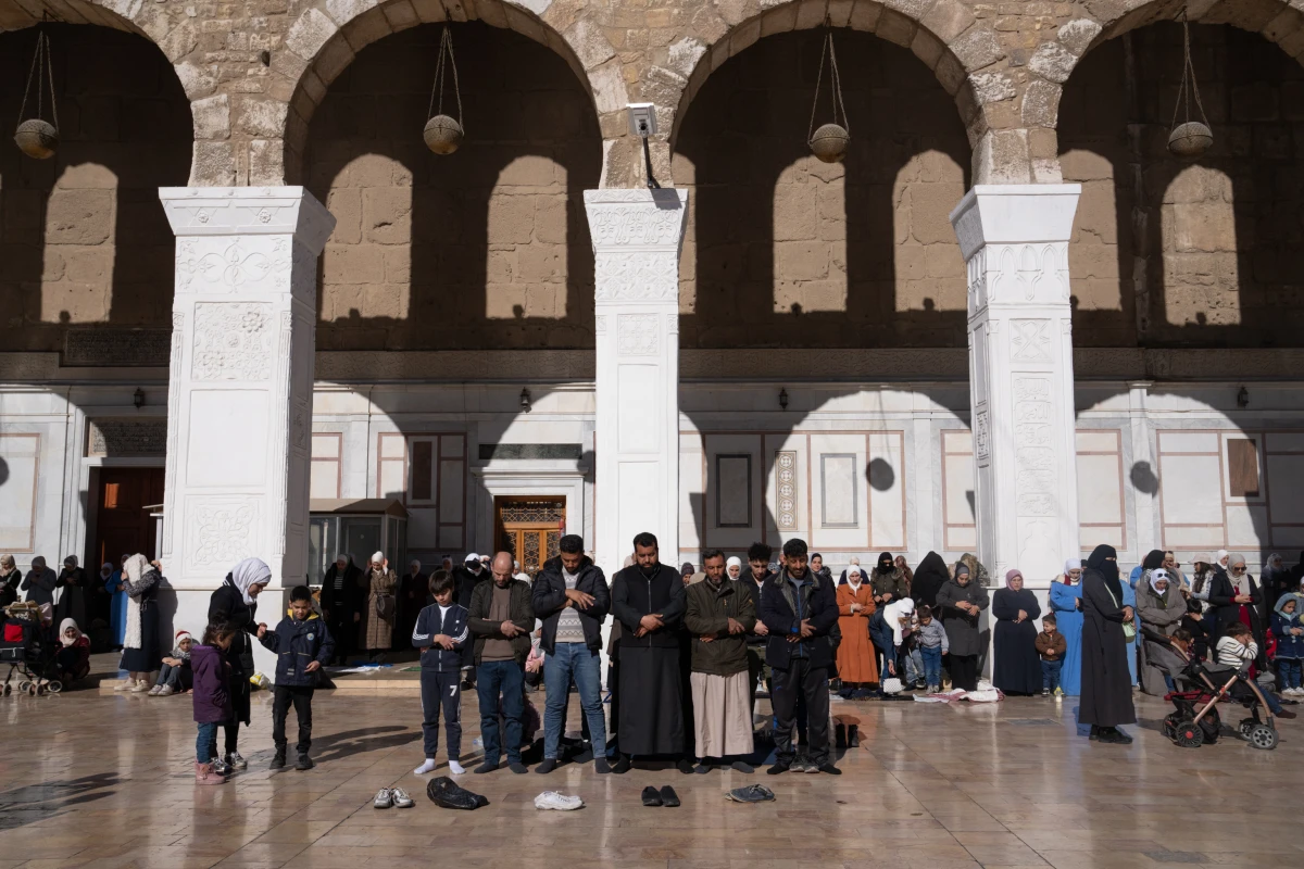 People gather on Friday at the Umayyad Mosque on Friday.