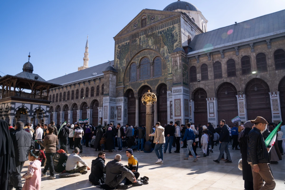 People gather in the Ummayad Mosque courtyard on Friday.