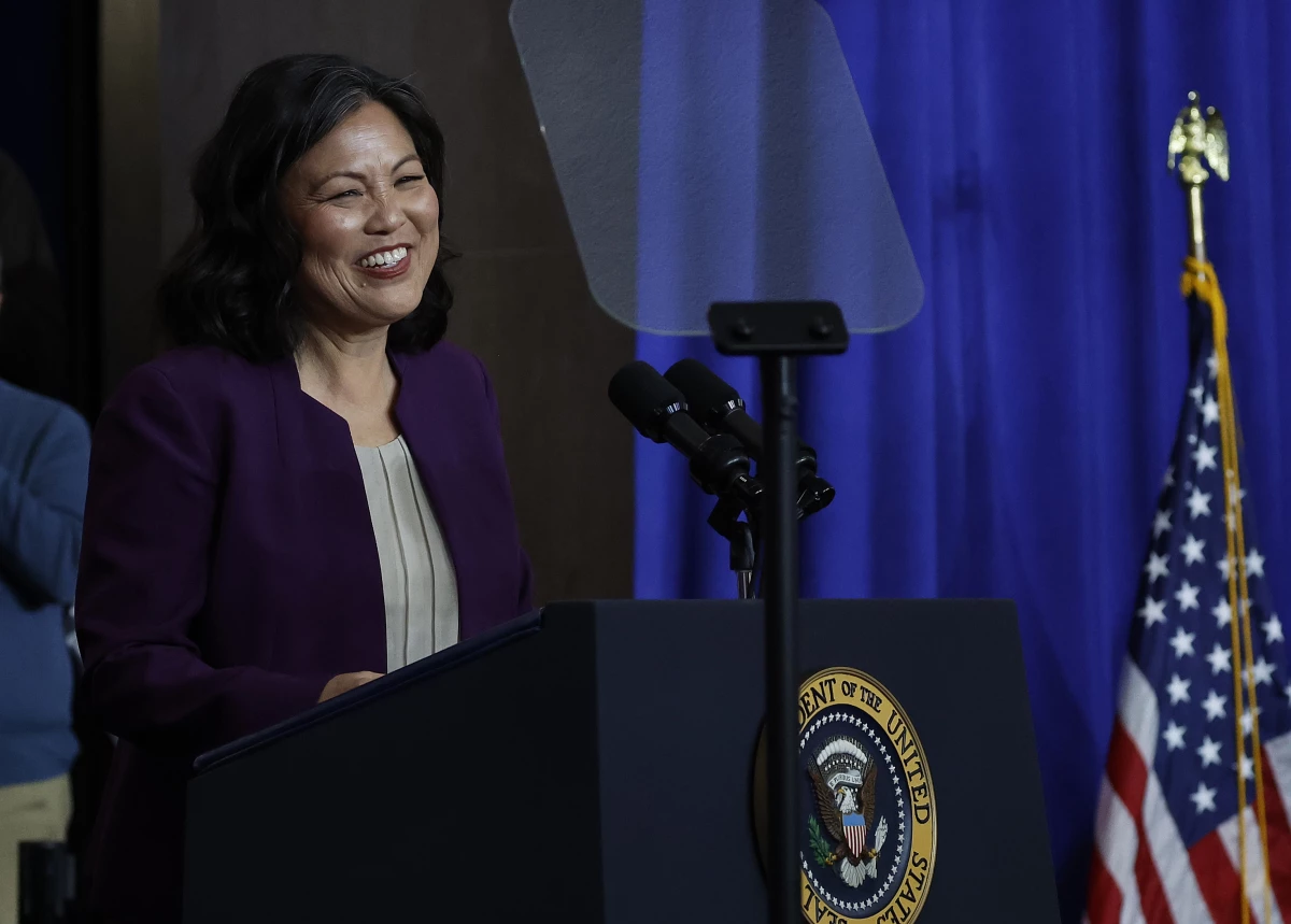 Acting U.S. Secretary of Labor Julie Su introduces President Biden during a ceremony Monday at the Department of Labor. Biden signed a proclamation to establish the Frances Perkins National Monument in Maine.