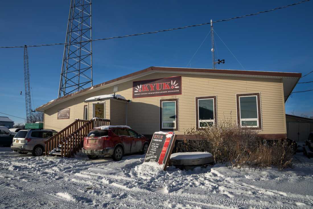KYUK broadcasts out of a small tan building at the base of a tall tower in Bethel, Alaska — about 400 miles west of Anchorage.