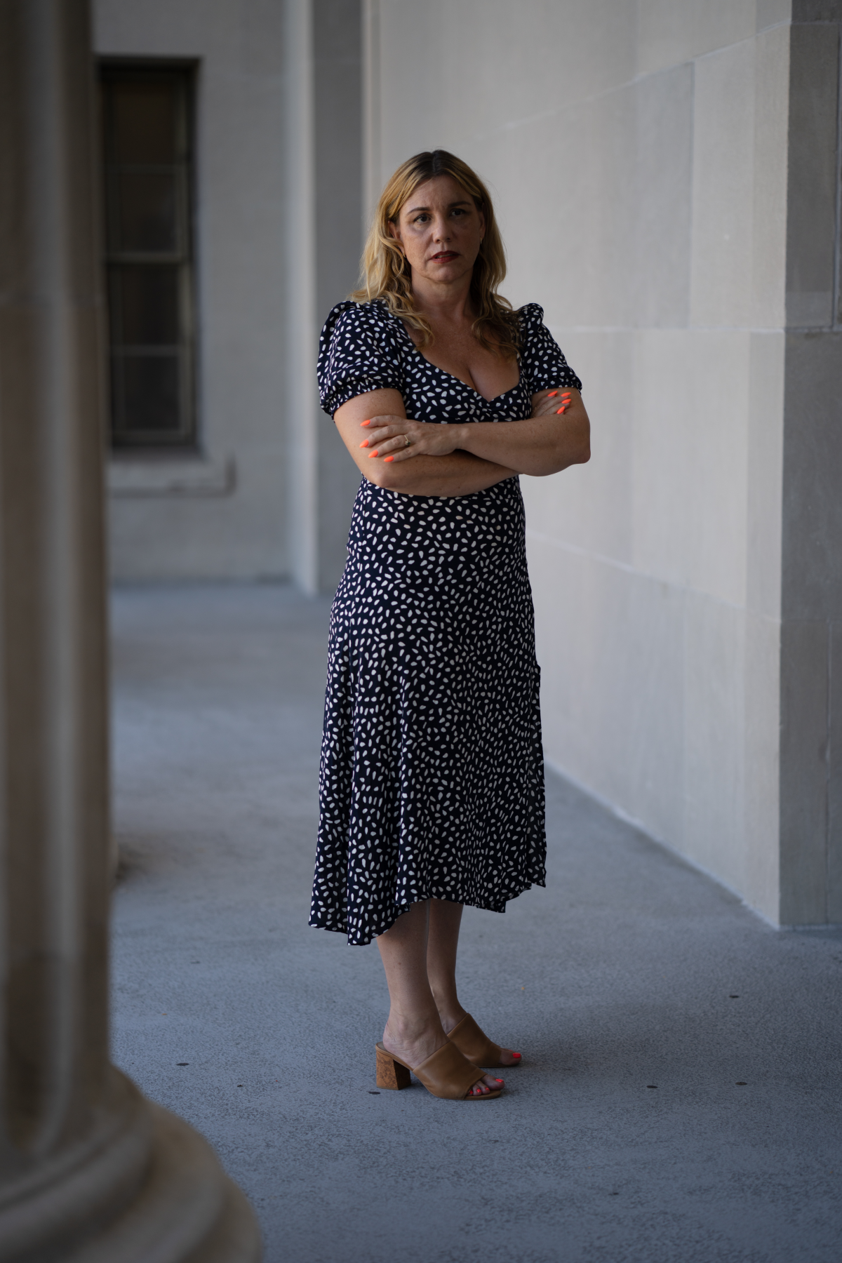 Meghan Garvey, the only full-time public defense attorney in New Orleans who was there in the days just after Katrina, stands outside the courthouse. When Hurricane Katrina hit nearly 20 years ago, she was just out of law school.