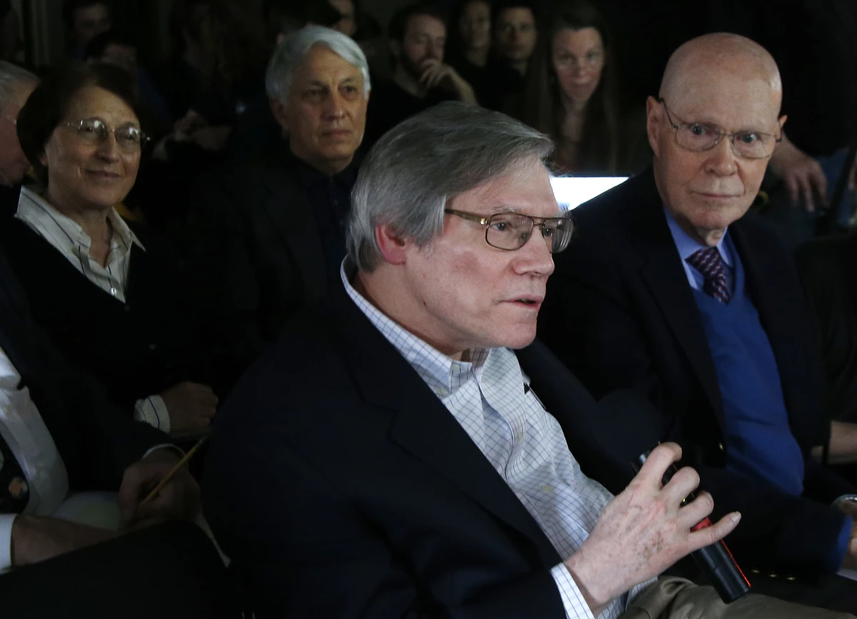 Physicist Alan Guth of the Massachusetts Institute of Technology asks a question during a news conference at the Harvard-Smithsonian Center for Astrophysics in Cambridge, Mass., on March 17, 2014, after researchers gave a presentation about their new findings on the early expansion of the universe.