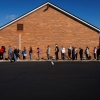 People wait in line to vote outside a polling station at the Dryland United Church of Christ in Nazareth, Pa., on Tuesday.