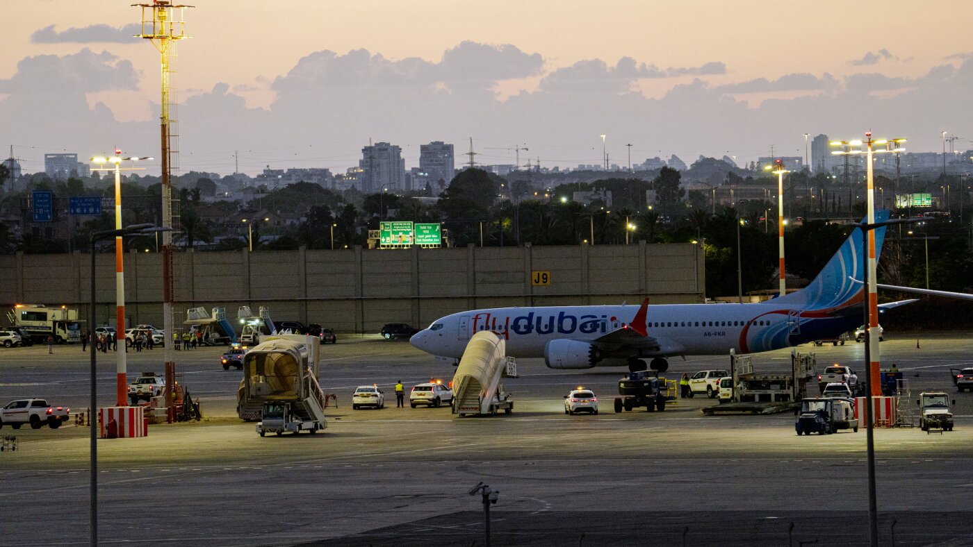Passengers recount chaos on Tel Aviv flight. And, FBI probes employee-data hack