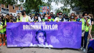 Protesters participate in the Good Trouble Tuesday march for Breonna Tayloron TuesdayAug. 252020in LouisvilleKy.