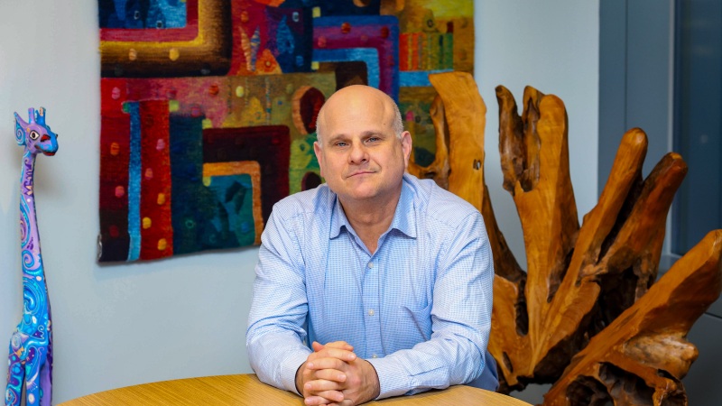 Dean Karlan, professor of economics and finance at Northwestern University and former chief economist for USAID in his office at Northwestern University on February 25. He resigned on Tuesday. He says he reached out to offer help in plotting a future course for the agency but got no response.