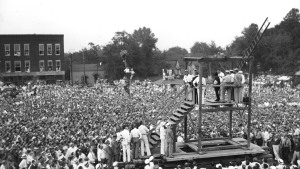 A huge crowd gathers around a scaffold to witness the public hanging of Rainey Bethea in 1936 in Owensboro, Ky. Public outrage over the spectacle made Bethea's death the last public hanging in the country.
