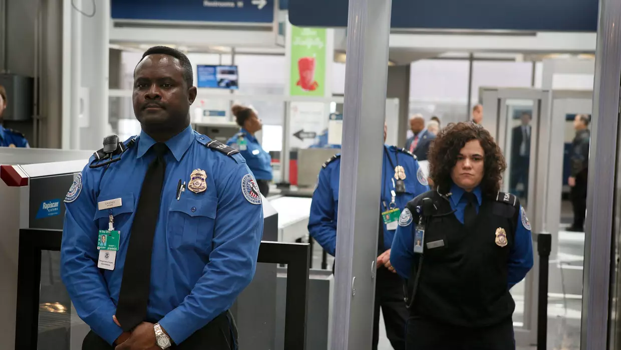 Transportation Security Administration officers staff a checkpoint at O'Hare International Airport in Chicago, Ill., in this 2010 file photo. The agency was created after the Sept. 11, 2001, attacks — but not every U.S. airport uses federal screeners.