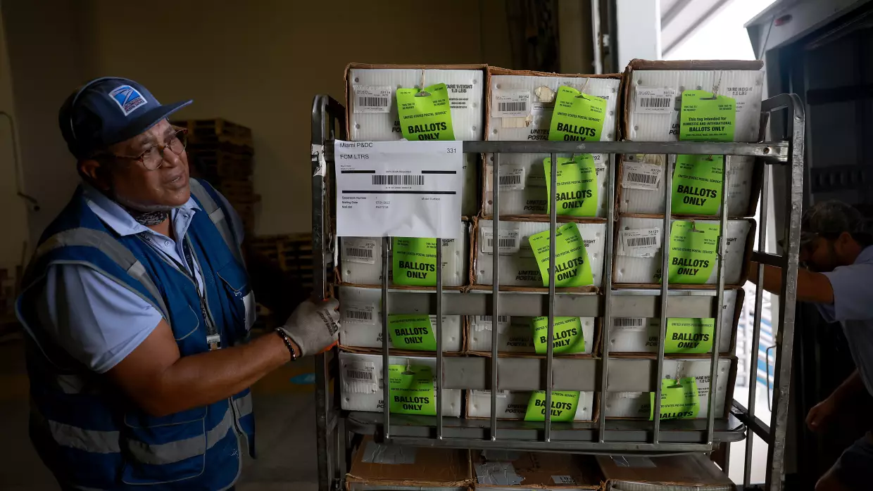 Judge clears the way for Postal Service work on Trump's mail-in voting order for now