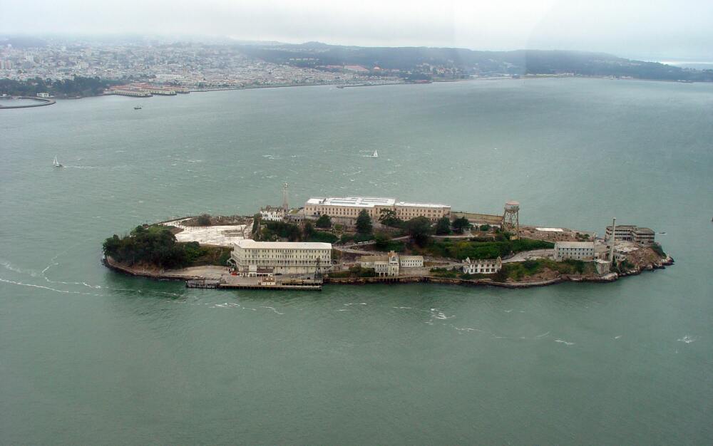 The former federal prison complex on Alcatraz Island is seen in 2005. The site has been operated by the National Parks Service for decades — but President Trump says he is ordering federal agencies to rebuild and expand a penitentiary site on the island in San Francisco Bay. (AFP via Getty Images)