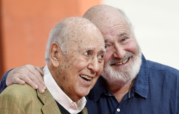 Carl and Rob Reiner pose together following a hand and footprint ceremony for them at the TCL Chinese Theatre in Los Angeles on April 7, 2017.
