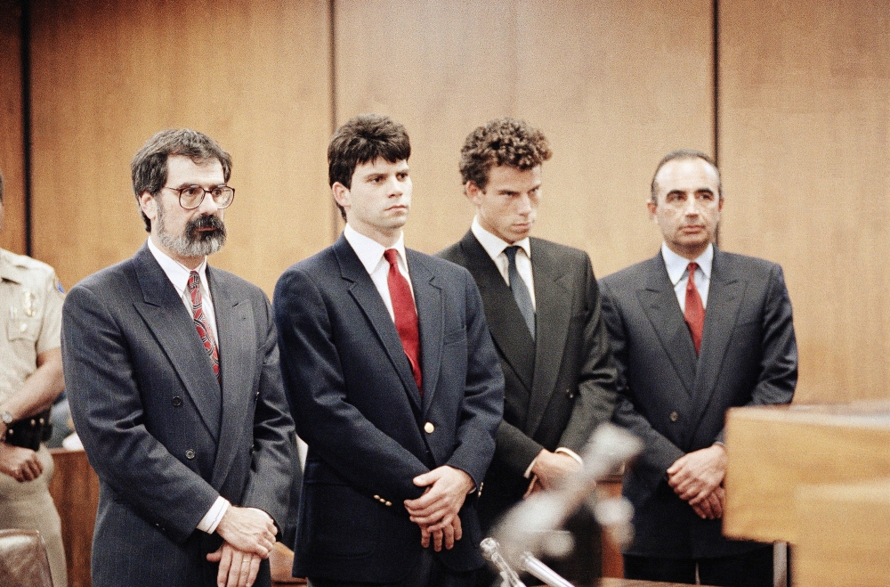 Lyle Menendez (second from left) and his brother, Erik are flanked by their attorneys Gerald Chaleff (left) and Robert Shapiro, in Beverly Hills Municipal Court in 1990. (AP)