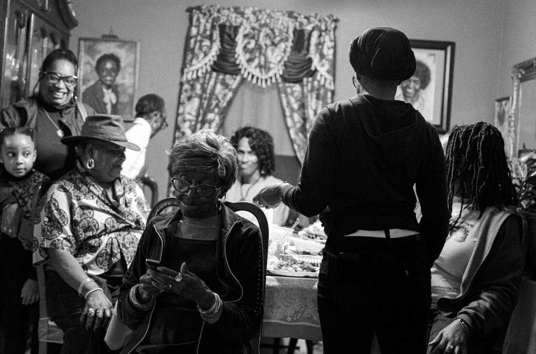 The women of Stevens’ maternal family gather around a family dinner in Cambria Heights, a neighborhood in Queens, N.Y.