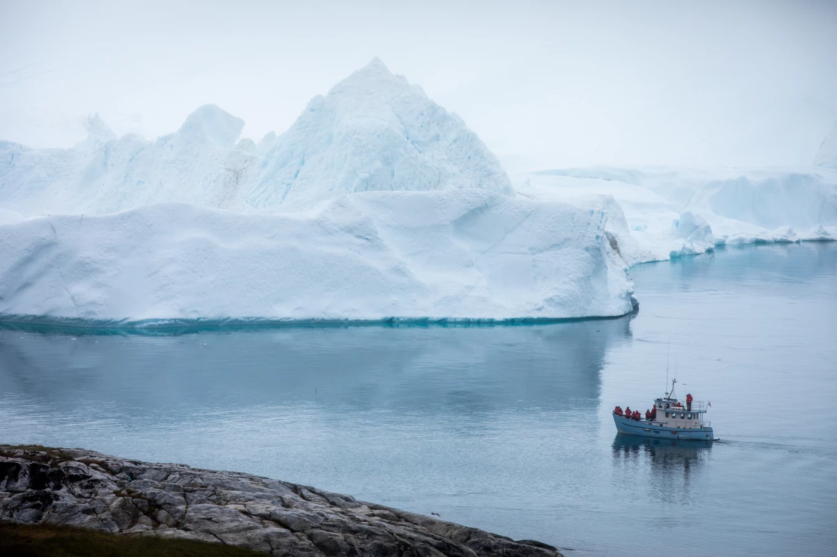 An iceberg in Ilulissat, Greenland. Ice sheets in Greenland and Antarctica are melting rapidly, and that melt will accelerate as the Earth heats up.