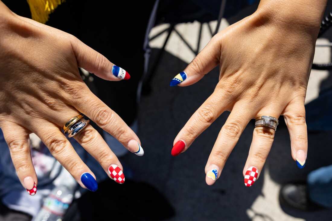 Irma Aguirre shows off her Croatia and Bosnia-Herzegovina nails.