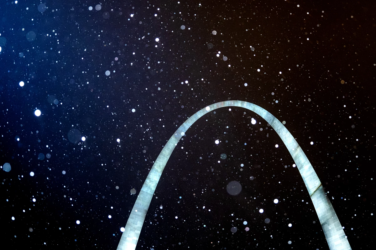 Snow falls on the Gateway Arch National Park during the waning hours of Saturday, January 4, 2025, in downtown St. Louis. Snow and ice are expected to pummel the Midwest — and notably Missouri — as Winter Storm Blair makes its way across the country.