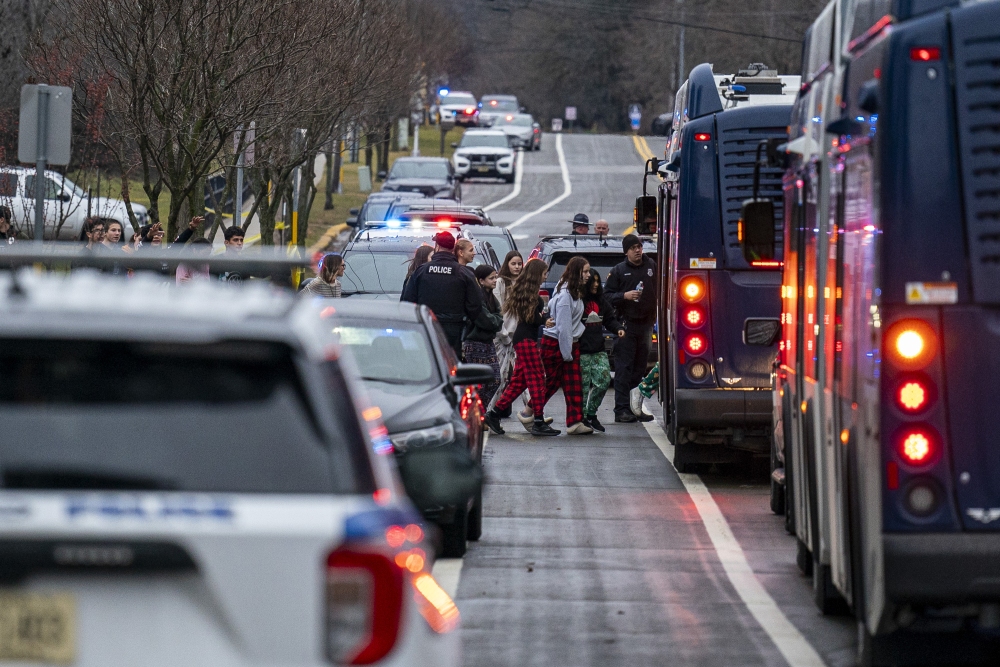 Emergency vehicles are parked outside the Abundant Life Christian School in Madison, Wis., where multiple injuries were reported following a shooting on Monday. (Getty Images)