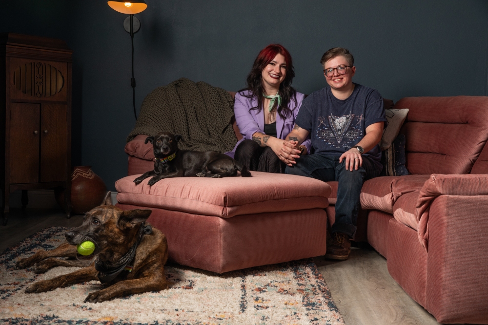 Lauren Tuvell (left) and James Watts with their dogs Xena and Desi in their home in Downtown Las Vegas on Sept. 24, 2024.