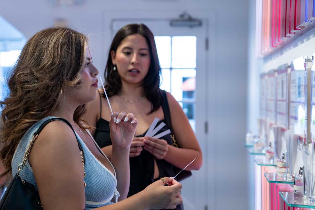 Customers smell some of the tester fragrances at Olfactory NYC at their Georgetown location on Thursday May 16, 2024.