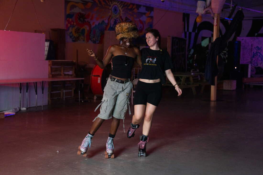 Diana Ledet and Chrishana Simon skate around the New Orleans Free Store, in the lower ninth ward of New Orleans, La. on their free skate night on Aug. 19, 2026.