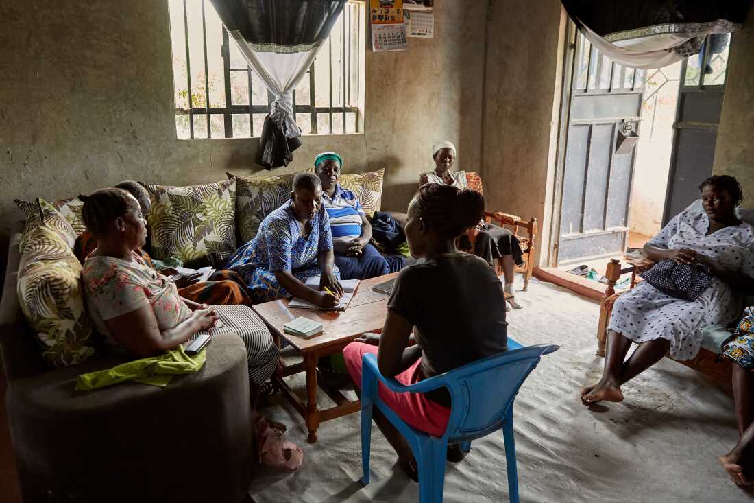 Table banking group astatine Justine's home, Nyang'ande, Kisumu, Kenya, 2025.