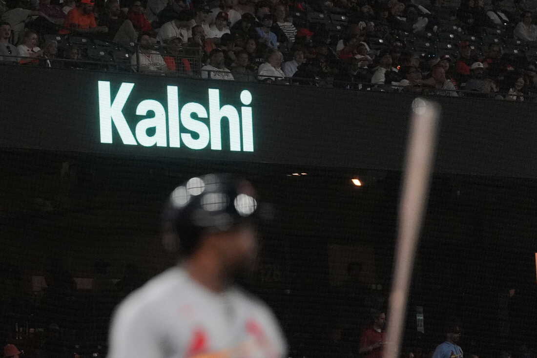 A Kalshi sign is displayed at Oracle Park during a baseball game between the San Francisco Giants and the St. Louis Cardinals, Tuesday, Sept. 8, 2026, in San Francisco.