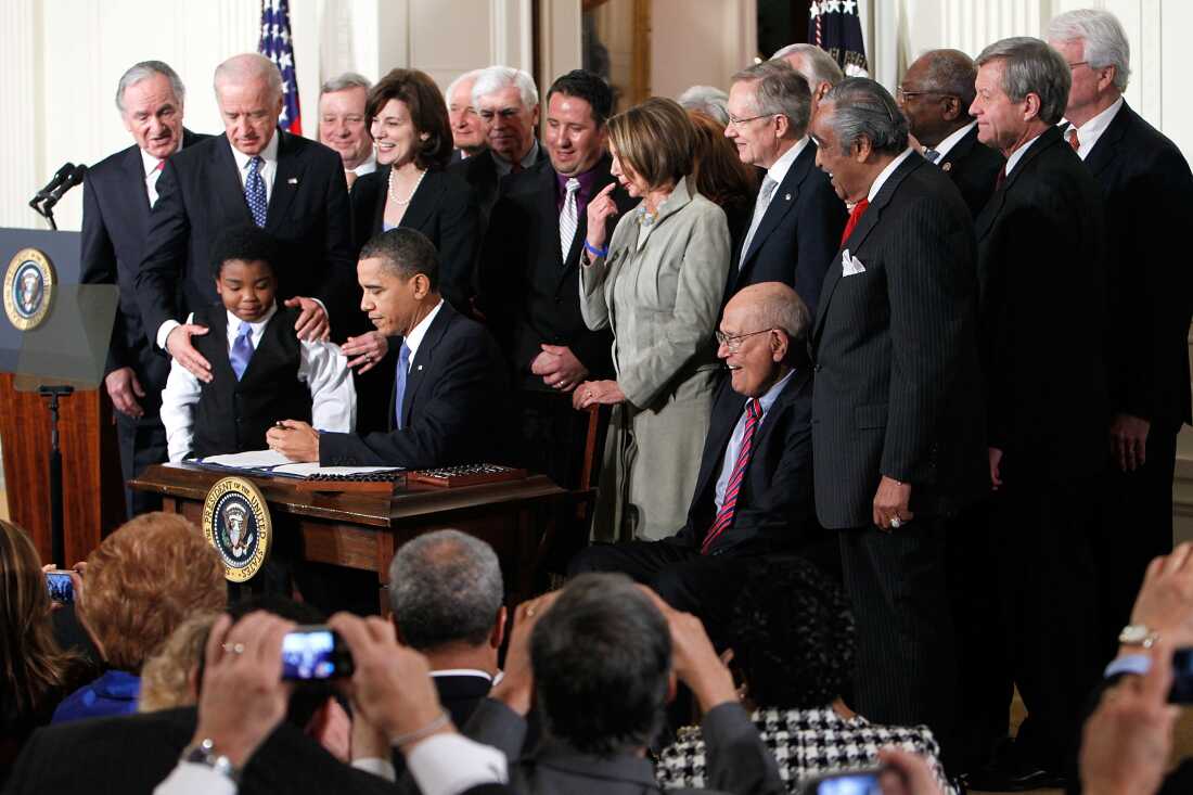 President Obama signed the Affordable Care Act into law in the East Room of the White House on March 23, 2010 in Washington, D.C. Fifteen years later, the political debate over the law continues to dominate in Congress.