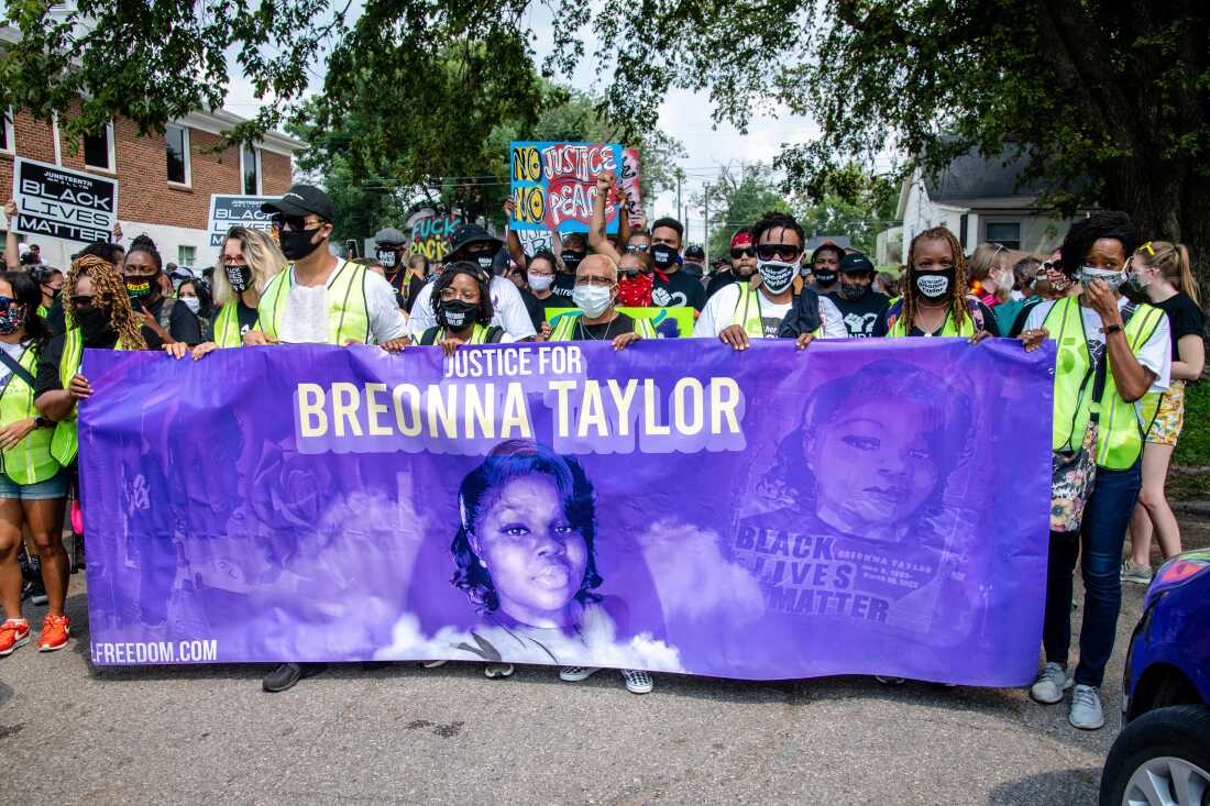 Protesters participate in the Good Trouble Tuesday march for Breonna Taylor, on Tuesday, Aug. 25, 2020, in Louisville, Ky.