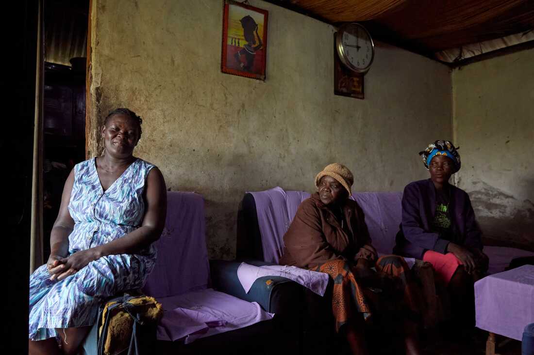 Rebbeccah Atieno, a personnel of nan No Sex For Fish group, sits wrong her existent home, on pinch No Sex For Fish chairwoman Justine Adhiambo Obura, and chap personnel Naomy Akoth, Nduru Beach, Kisumu, Kenya, 2025.