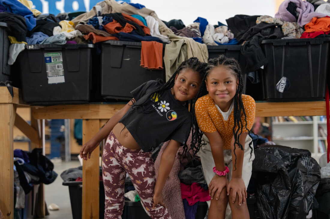 Sisters Angela and Gloria Calix at the New Orleans Free Store, in the Lower Ninth Ward of New Orleans, La. on Aug. 20, 2026.