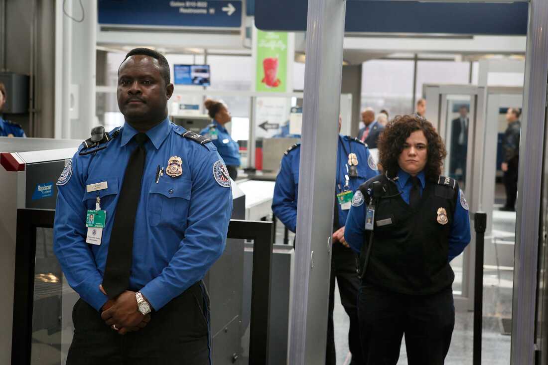 Transportation Security Administration officers staff a checkpoint at O'Hare International Airport in Chicago, Ill., in this 2010 file photo. The agency was created after the Sept. 11, 2001, attacks — but not every U.S. airport uses federal screeners.
