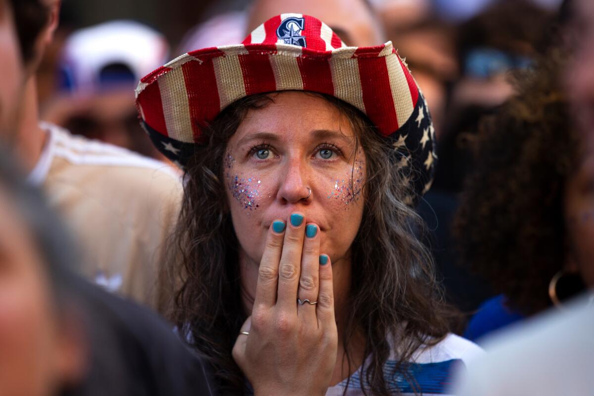 Hannah Bourne, of Edmonds, Wash., reacts during the second half of the FIFA World Cup knockout round match between the U.S. and Belgium during a watch party on Monday, July 6, at Occidental Square in Seattle's Pioneer Square neighborhood. The U.S. lost, 4-1.