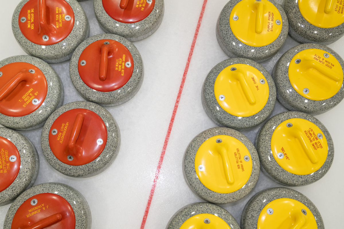 Stones are lined up on the ice at the Potomac Curling Club in February.